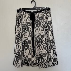 Women's Size 12 John Paul Richard Uniform 100% Silk Black Floral Tie Front Skirt